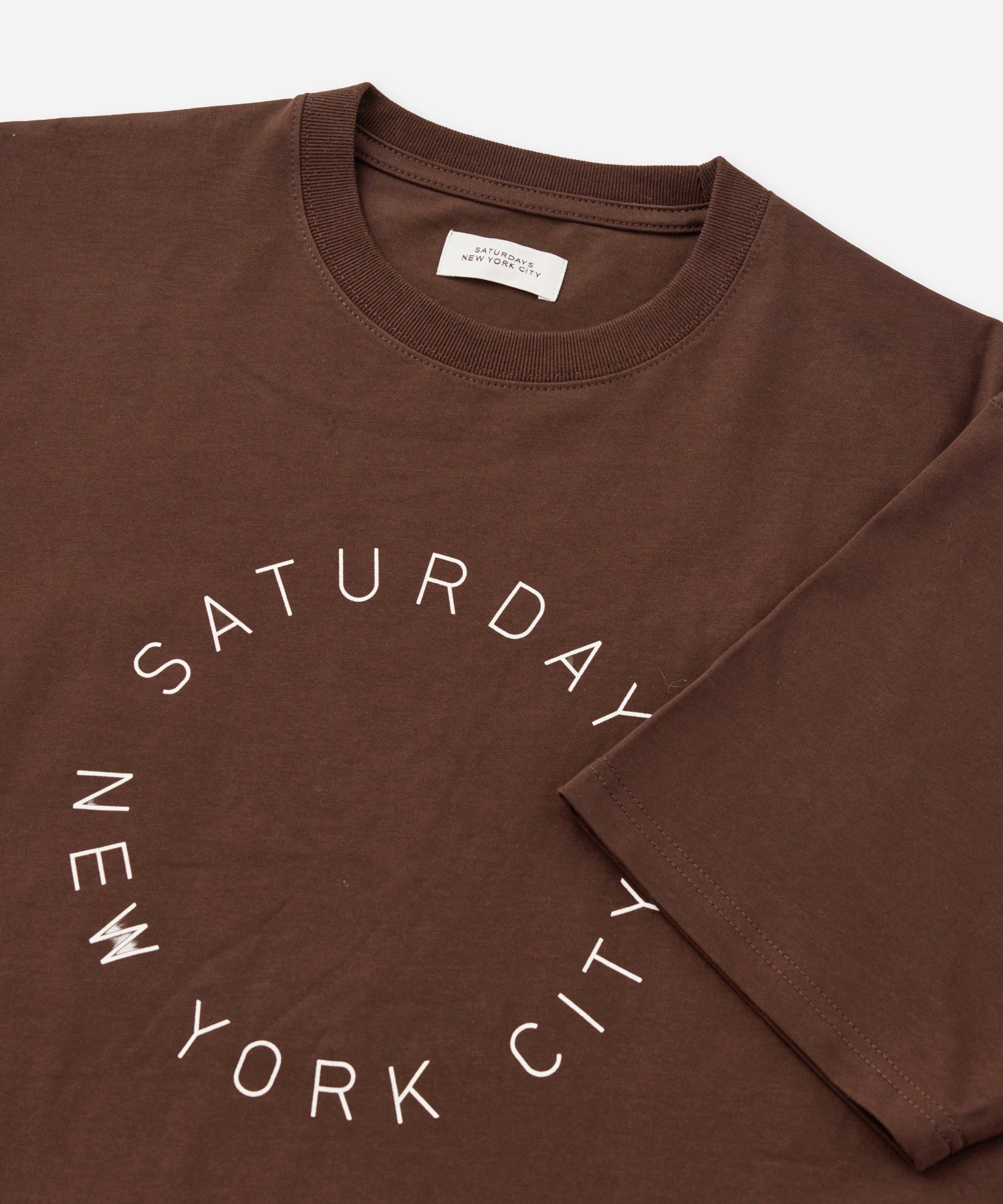 Saturdays NYC Circular Saturdays Logo Short Sleeve Tee in Dark Brown