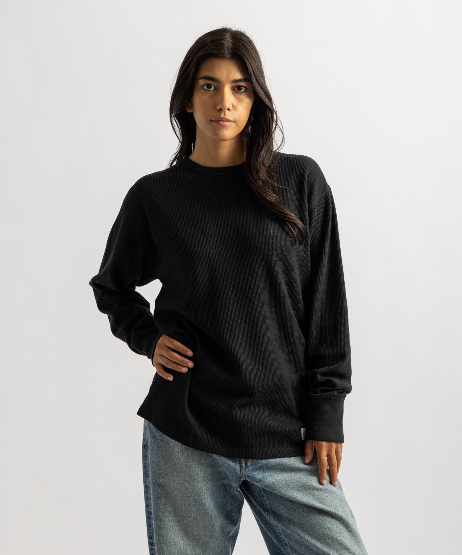 Hanes x Saturdays NYC Waffle Long Sleeve Tee in Black, worn by female model, front view